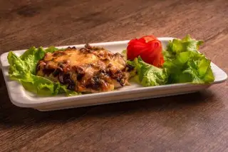 Куриная отбивная с грибами под сыром